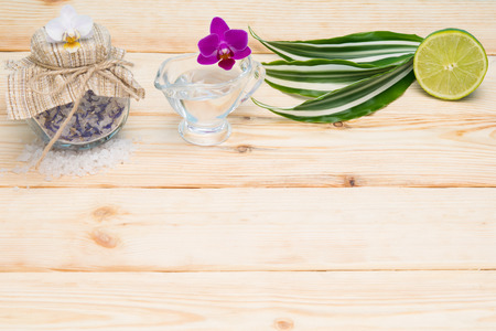 Set on a wooden table for spa with saltの写真素材
