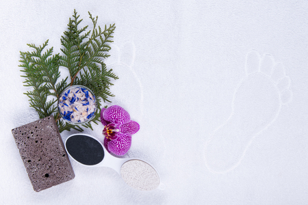 Foot care kit on white towelの写真素材