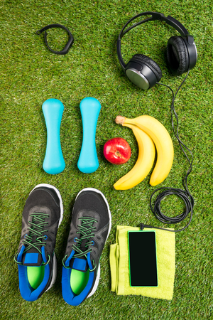Set for fitness and sports nutrition, against the background of grassの写真素材