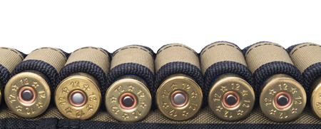 Tape with cartridges for hunting rifle, concept on white backgroundの写真素材
