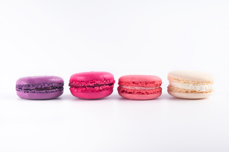 four colorful biscuits macaron hardly on a light backgroundの写真素材