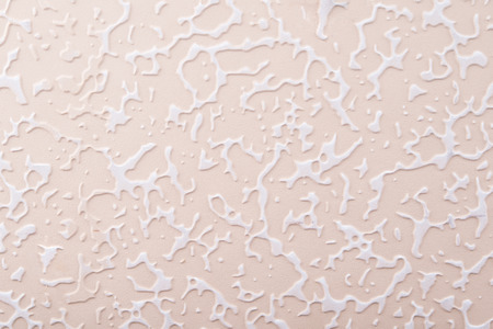 beige texture for background, with white patternsの写真素材