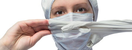 medical worker removes a rubber glove from his hand, close-upの写真素材