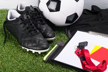 things for a football referee on a green lawnの写真素材