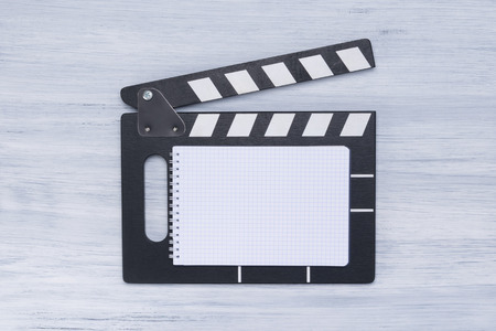 wooden clapper director for filming a movie on a gray white backgroundの写真素材