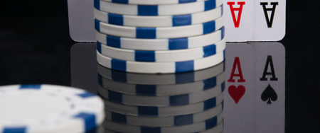 in the black background of the game table, two cards are reflected to win blackjackの写真素材