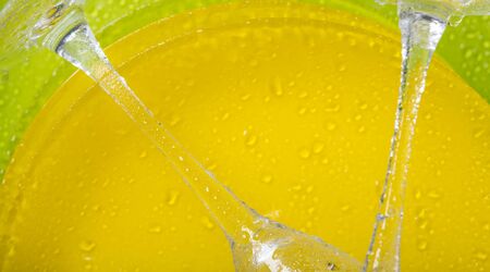 close-up, drops of water on clean plates and two legs of glasses,after dishwasher, backgroundの写真素材
