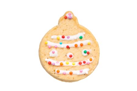 handmade cookies in the shape of a Christmas tree toy isolated on white backgroundの写真素材