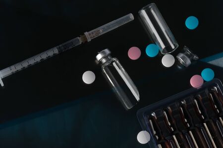 concept of vitamin, dietary supplements and medical equipment on the background of x-rays