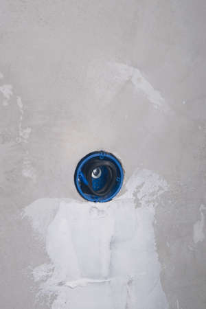 putty-sealed internal wiring of the outlet, there is a place for the inscriptionの写真素材