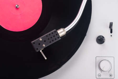 close-up of a music player, vinyl records, top view, there is a place for an inscription