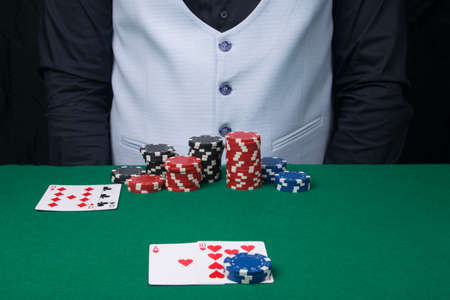 close-up of a gaming table in a casino with chips instead of money for pokerの写真素材