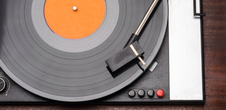old turntable for musical vinyl records, top view close-up