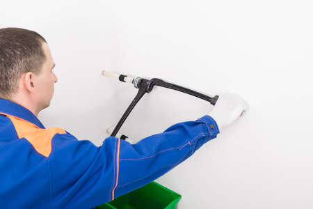 installation by a special tool of a tap to shut off the waterの写真素材