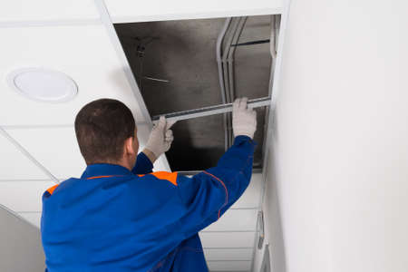 assembly of false ceilings in office premisesの写真素材
