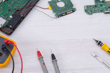 on a light background, a set of tools for repairing and replacing batteries and the smartphone screenの写真素材