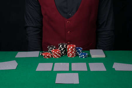 closed card backs, laid out by the dealer, for poker playersの写真素材