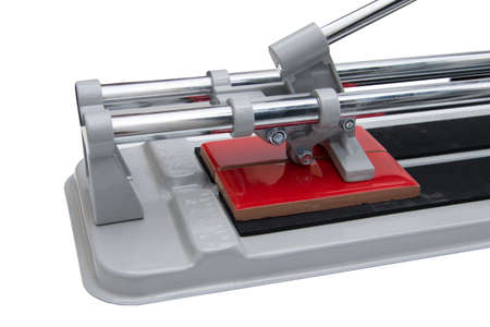 cutter, for manual cutting of marble and ceramic tiles, on a white background, close-upの写真素材