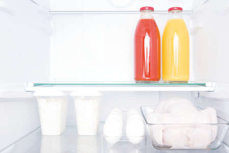 refreshing drinks on the shelf in the refrigerator, front viewの写真素材