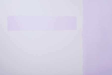 white wall painted in light purple color, backgroundの写真素材