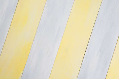 background, light gray-yellow wooden surfaceの写真素材