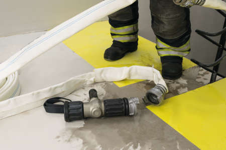 firefighters finished extinguishing the fire indoors, concept close-up view
