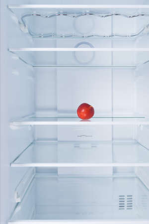 nectarine fruit in the refrigerator on the shelf, on a white backgroundの写真素材