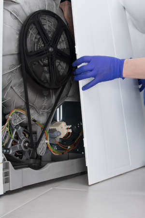 repair of household appliances carrying out technical inspection, close-up viewの写真素材