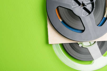 old magnetic cassettes, concept on green background