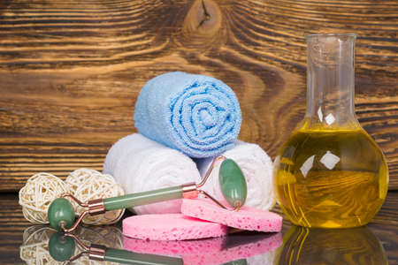 set for massage and spa treatments on wooden backgroundの写真素材