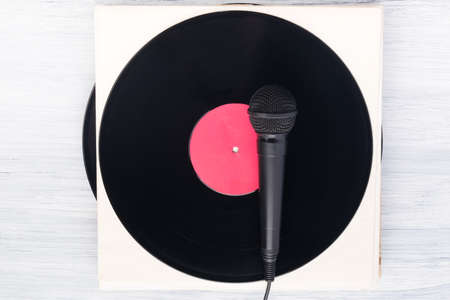 a large vinyl plate lies on a light gray backgroundの写真素材
