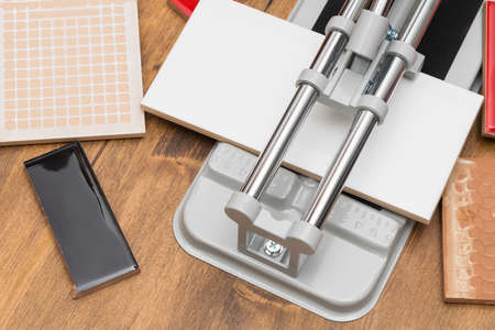 tile cutter cuts ceramic tiles, top viewの写真素材