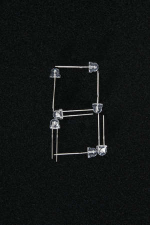 spare LEDs for soldering the board, laid out as a background, in the form of the number eightの写真素材