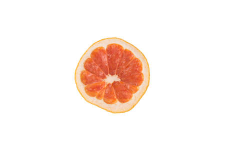 round piece of dried grapefruit, on a white backgroundの写真素材