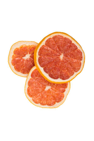close-up, three round pieces of dried grapefruit, on a white backgroundの写真素材