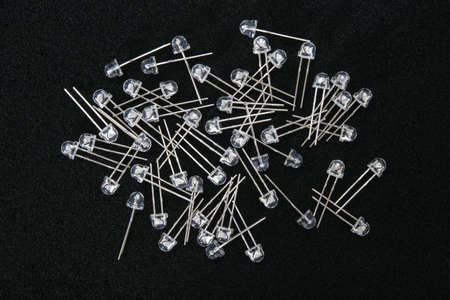 a set of new LEDs with long contacts, for repair and replacement, on a black background