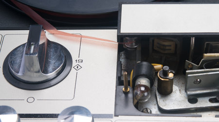 close-up of the switch of an old tape recorder and the internal device, for reading magnetic tapeの写真素材