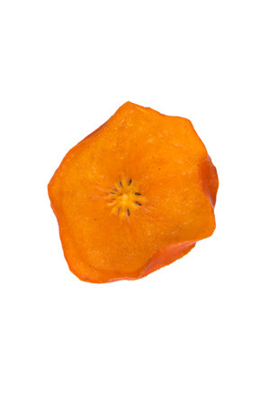 close-up, dried piece of persimmon, on a white backgroundの写真素材