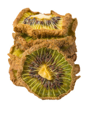 sliced dried fruit, kiwi, close-up, on a white background, with a place for the inscriptionの写真素材