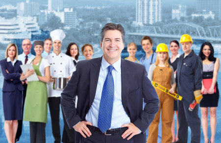 Businessman and Group of industrial workers Businessman and Group of industrial workers