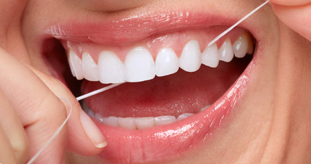 woman smile with tooth flossの写真素材