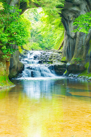 Waterfall in the mountainsの写真素材