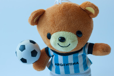 doll bear play footballの写真素材