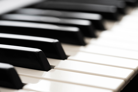 Piano keys close up, piano keyboard, black and white music backgroundの写真素材