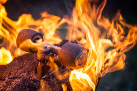 Old skateboard on fire.の写真素材