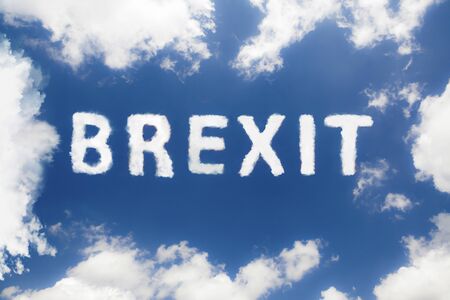 Word brexit on blue sky inside cloud form frame, financial concept.の写真素材