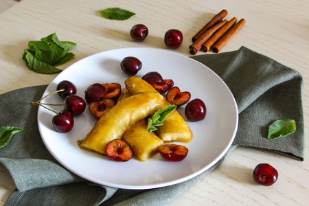 Homemade caramelized banana on white plate. Vegan dessert. American dish.の写真素材