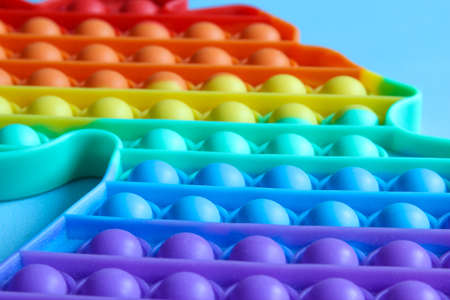 Pop it sensory toy from soft silicone bubbles. Stress and anxiety relief. Trendy game for stressed...
