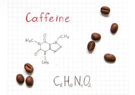 Chemical formula of Caffeine with some grains of coffee. close-up. high quality photoの写真素材
