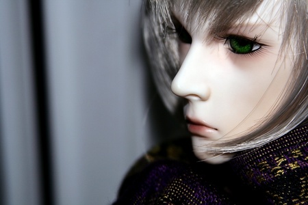 A face of a ball-jointed doll with a free space on the leftの写真素材